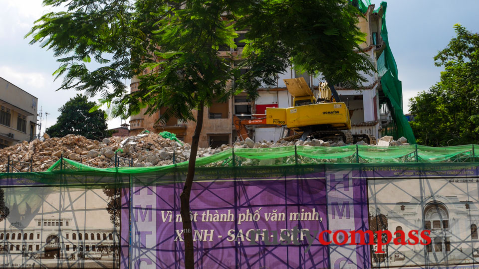 With images of heritage buildings, the sign reads 